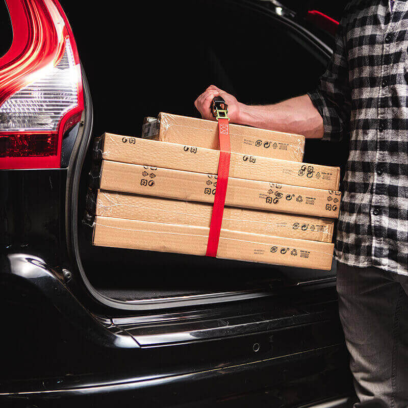 Four carton boxes being carried with Grip Carrying Handle